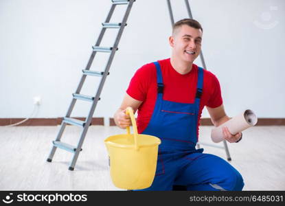 Contractor worker preparing for wallpaper decoration