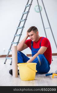 Contractor worker preparing for wallpaper decoration