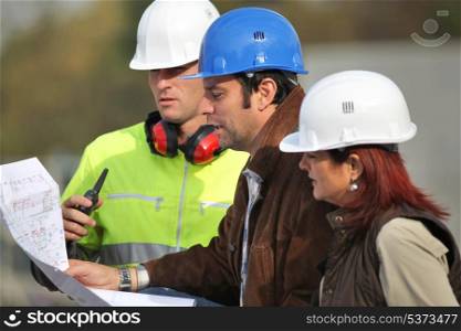 Contractors discussing a project