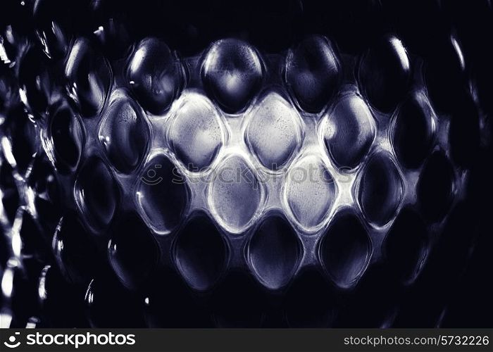 Contrast glass background with geometric pattern macro