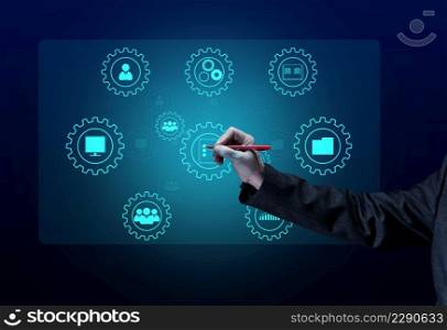Control and management of business processes in the enterprise for efficient operation and increased profits. Concept with manager&rsquo;s hand and gears on holographic screen
