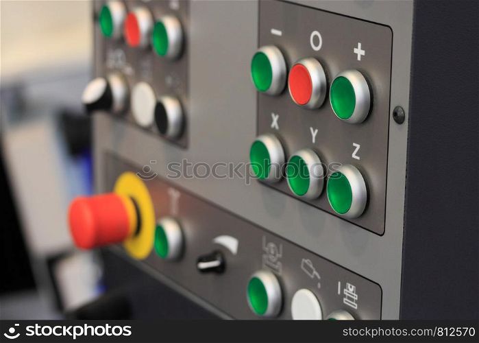 Control panel of CNC machining center. Closeup view.