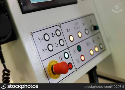 Control panel of CNC metalworking machine. Selective focus.