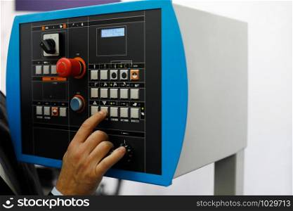 Control panel of the automated metalworking machine. Selective focus.