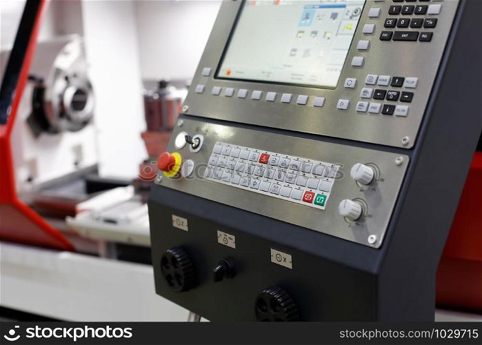 Control panel of the CNC machining center. Selective focus.