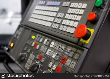 Control panel of the modern CNC machine. Selective focus.