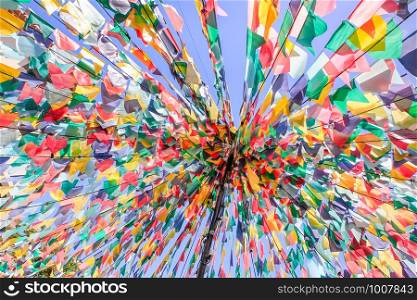 Converging lines with colorful flags as decoration for festivity in Portugal