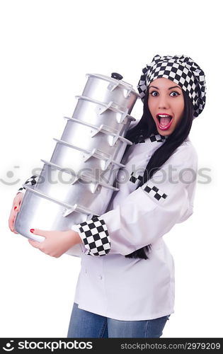 Cook with stack of pots on white