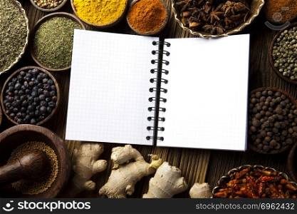 Cookbook and various spices, orintal cuisine vivid theme
