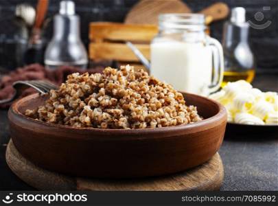 cooked buckwheat with a slice of butter