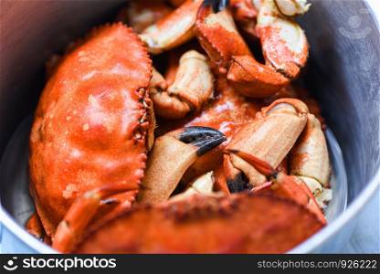 Cooked crab on steamer pot / Seafood boiled red stone crabs