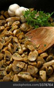 cooked mushroom with parsley and garlic