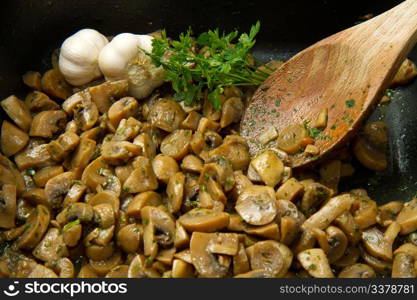 cooked mushroom with parsley and garlic