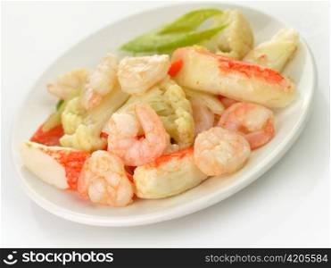 cooked shrimps with crab meat and vegetables