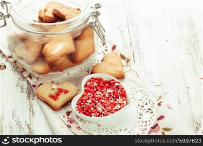 Cookie as a heart shaped valentine decor in glass jar. The Heart cookies