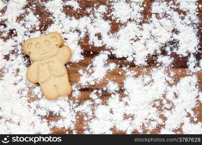 Cookie bear with flour on a cutting board
