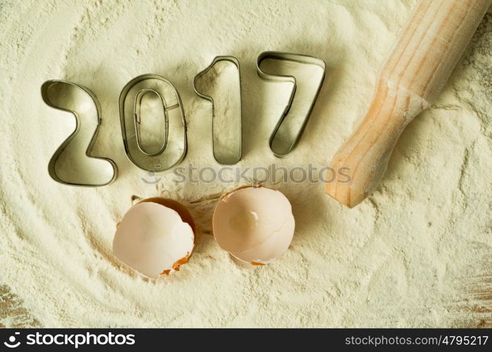 Cookie molds with the date 2017 on the flour