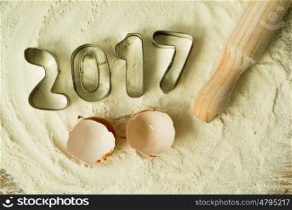 Cookie molds with the date 2017 on the flour
