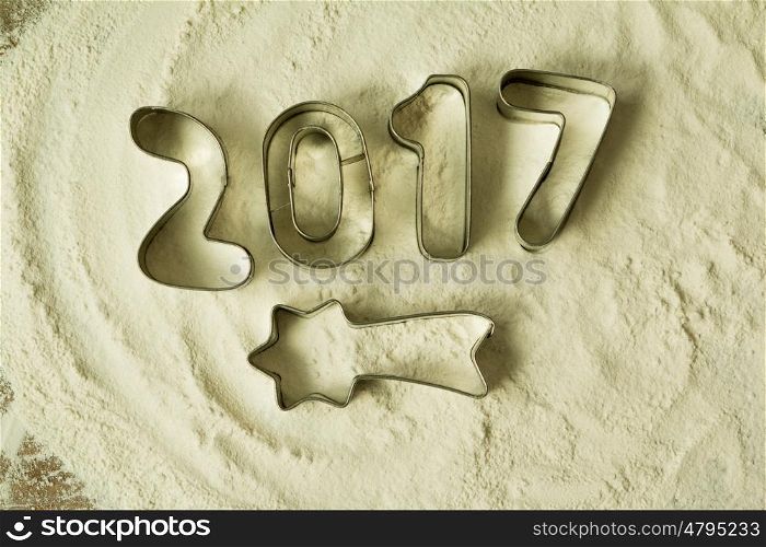 Cookie molds with the date 2017 on the flour