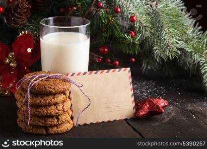 Cookie with milk and letter for Santa Claus