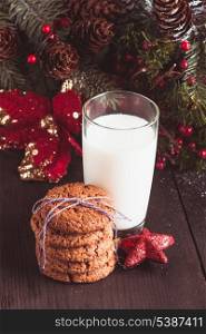 Cookie with milk on the table for Santa Claus
