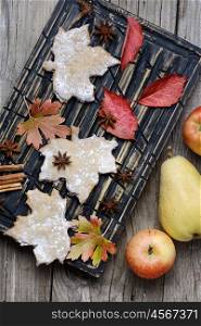 Cookies and autumn apples. Pastries like cookies maple leaf and autumn apples