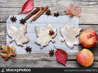 Cookies and autumn apples. Pastries like cookies maple leaf and autumn apples