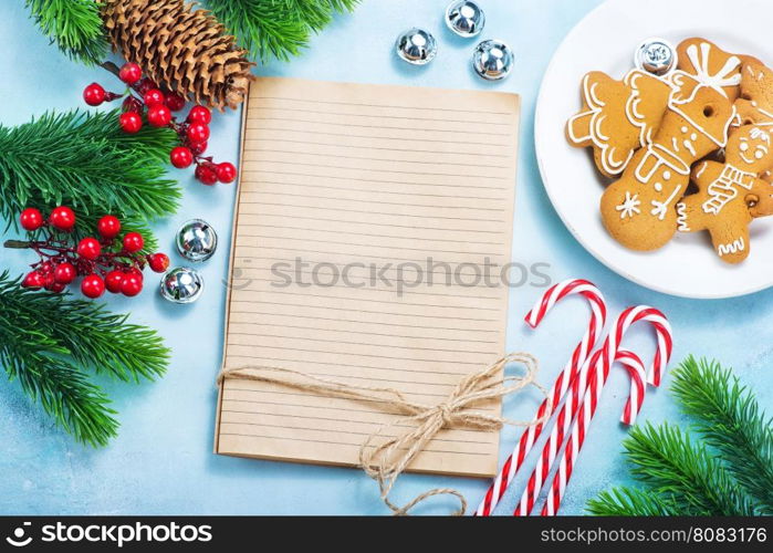 cookies and candycane on a table, christmas background