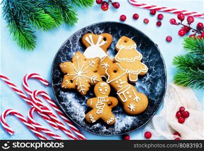 cookies and candycane on a table, christmas background
