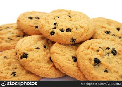Cookies with chocolate crisps on white background.