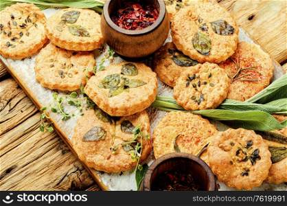 Cookies with sage,thyme and rosemary.Homemade appetizing shortbread cookies with spicy herbs. Cookies with spicy herbs