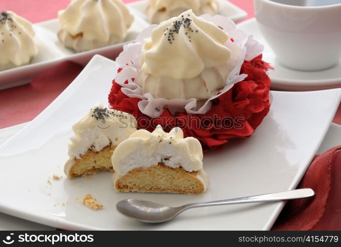 Cookies with zefirnoy filling in milk glaze with a cup of coffee