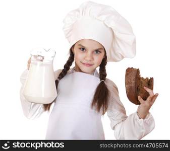 Cooking and people concept - Little girl in a white apron holding a jug of milk, isolated on white background