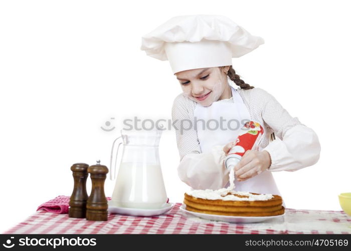 Cooking and people concept - smiling little girl in cook hat, isolated on white background