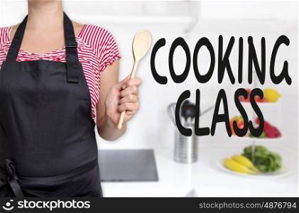 cooking class cook holding wooden spoon background concept. cooking class cook holding wooden spoon background concept.