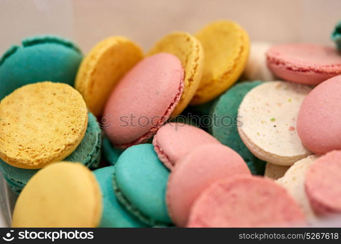 cooking, confectionery and baking concept - close up of macarons. close up of macarons