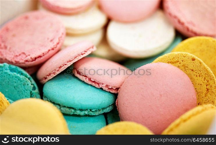 cooking, confectionery and baking concept - close up of macarons. close up of macarons