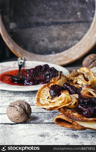 Cooking delicious homemade pancakes in a rustic style. Delicious homemade pancakes