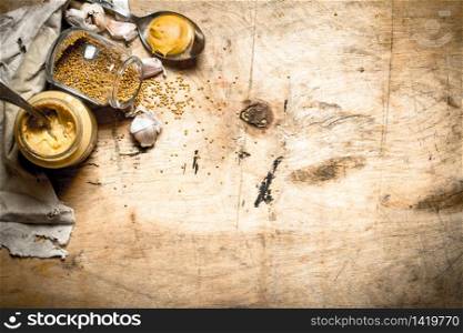 Cooking fresh mustard. On a wooden background.. Cooking fresh mustard.