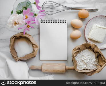 Cooking homemade bakery products. Close-up, view from above, wooden board. White, isolated background. Delicious and healthy food concept. Cooking homemade bakery products. Delicious and healthy food concept