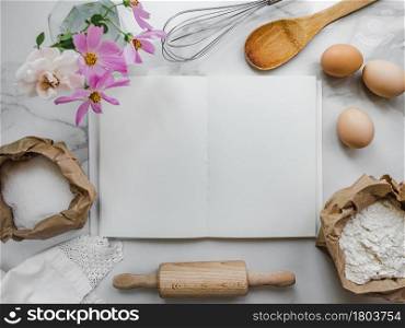 Cooking homemade bakery products. Close-up, view from above, wooden board. White, isolated background. Delicious and healthy food concept. Cooking homemade bakery products. Delicious and healthy food concept