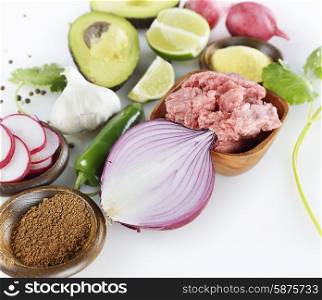 Cooking Ingredients with Ground Beef and Vegetables