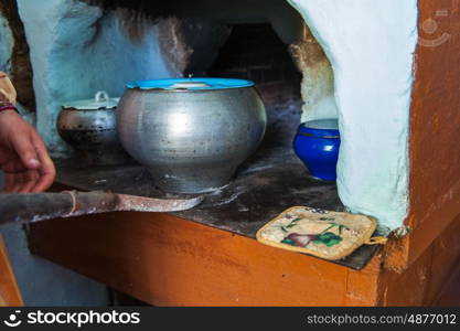 Cooking meals in a Russian stove, soup with meat and groats