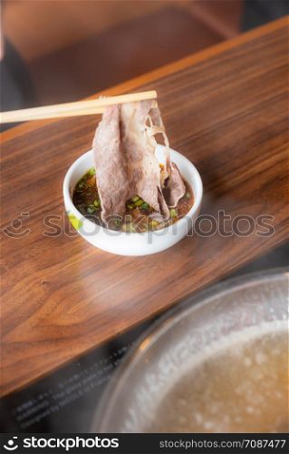 Cooking of japanese wagyu beef Shabu Shabu set hot pot