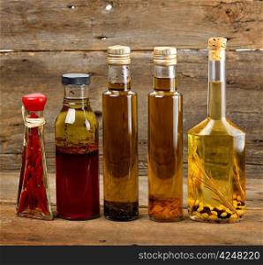Cooking Oil Assortment On Wooden Background