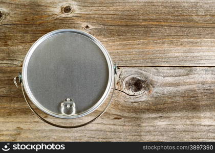 Cooking pan for Hiking or camping on rustic wooden boards.