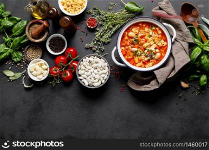 Cooking pasta e fagioli soup with chicken meat and vegetables, italian cuisine