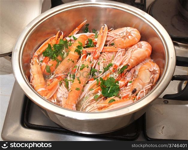cooking scampi shrimps and vegetables