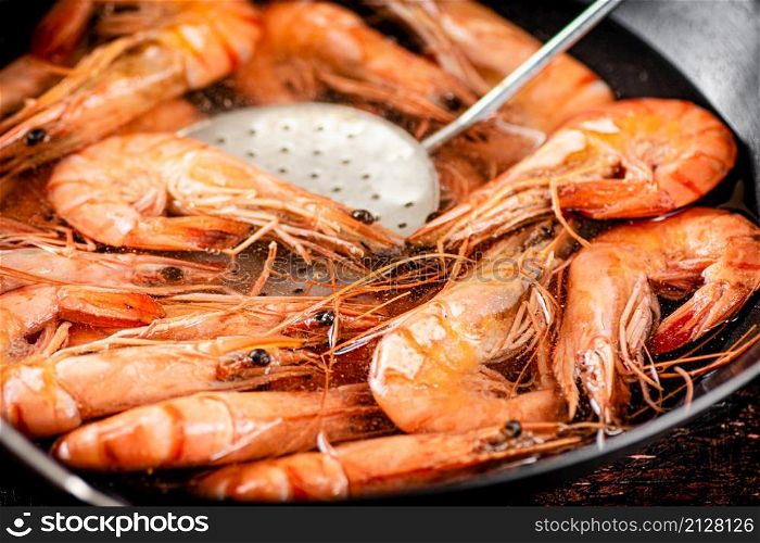 Cooking shrimp in water. Macro background. High quality photo. Cooking shrimp in water. Macro background.