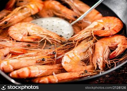 Cooking shrimp in water. Macro background. High quality photo. Cooking shrimp in water. Macro background.